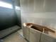 Bathroom featuring a walk-in shower and a modern vanity at 170 Cherry Bark Dr, Youngsville, NC 27596