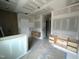 Unfinished bathroom with natural cabinets, neutral color palette and multiple doorways at 170 Cherry Bark Dr, Youngsville, NC 27596