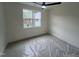 Bright bedroom with a ceiling fan and large window, offering natural light at 170 Cherry Bark Dr, Youngsville, NC 27596
