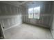 Bright bedroom with a large window offering outdoor views at 170 Cherry Bark Dr, Youngsville, NC 27596