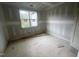 Unfinished bedroom showing window and door frames ready for completion at 170 Cherry Bark Dr, Youngsville, NC 27596