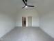 Spacious bedroom featuring a vaulted ceiling, ceiling fan and easy access to the bathroom and closet at 170 Cherry Bark Dr, Youngsville, NC 27596