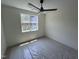 Bedroom featuring carpet floors, large window, and ceiling fan at 170 Cherry Bark Dr, Youngsville, NC 27596