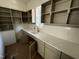 Gray butler's pantry features marble countertops, subway tile, and custom cabinets at 170 Cherry Bark Dr, Youngsville, NC 27596