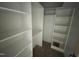A walk-in closet is fitted with shelves, providing storage at 170 Cherry Bark Dr, Youngsville, NC 27596
