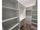 Walk-in closet with ample shelving and storage space at 170 Cherry Bark Dr, Youngsville, NC 27596