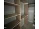 Walk-in closet with built-in shelving providing ample storage at 170 Cherry Bark Dr, Youngsville, NC 27596