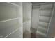 Walk-in closet features ample shelving and plenty of space for organizing your wardrobe at 170 Cherry Bark Dr, Youngsville, NC 27596