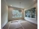 The dining room features new windows offering natural light and space for entertaining at 170 Cherry Bark Dr, Youngsville, NC 27596
