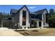 Beautiful two-story home with modern color scheme, including a gray garage and well-kept landscaping at 170 Cherry Bark Dr, Youngsville, NC 27596