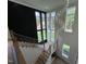 Grand foyer with a staircase, high ceilings, chandelier, and large windows at 170 Cherry Bark Dr, Youngsville, NC 27596