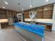 Spacious kitchen featuring a large island, custom cabinetry, and modern appliances awaiting final installation at 170 Cherry Bark Dr, Youngsville, NC 27596