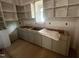 Unfinished kitchen with cabinets installed and natural light at 170 Cherry Bark Dr, Youngsville, NC 27596