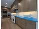 A kitchen showcases modern cabinetry, stainless steel appliances, and a designer backsplash at 170 Cherry Bark Dr, Youngsville, NC 27596