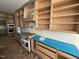 Unfinished kitchen with custom wood cabinets and marble backsplash ready for appliances at 170 Cherry Bark Dr, Youngsville, NC 27596
