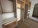 The kitchen nook includes custom shelves and cabinets around an appliance nook at 170 Cherry Bark Dr, Youngsville, NC 27596