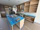 Spacious kitchen features custom wood cabinetry and a large island at 170 Cherry Bark Dr, Youngsville, NC 27596