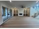 A spacious living room features built-in shelving, a fireplace, and access to an outdoor area at 170 Cherry Bark Dr, Youngsville, NC 27596