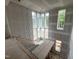 Unfinished Living room showing the wall of windows allowing for ample natural light at 170 Cherry Bark Dr, Youngsville, NC 27596