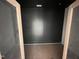 Dark room showcasing an accent wall and trim at 170 Cherry Bark Dr, Youngsville, NC 27596