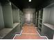Spacious walk-in closet with custom shelving and dark trim for ample storage and organization at 170 Cherry Bark Dr, Youngsville, NC 27596