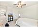 Bedroom features a TV, ceiling fan, and closet at 190 Salem Village Dr, Fuquay Varina, NC 27526