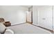 Spacious bedroom with wood floors, double closets, and a view to the entryway at 190 Salem Village Dr, Fuquay Varina, NC 27526