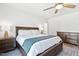 Inviting main bedroom featuring a cozy bed, stylish furnishings, and a relaxing ambiance at 190 Salem Village Dr, Fuquay Varina, NC 27526