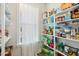 Spacious pantry with ample shelving for organized storage and a window for natural light at 190 Salem Village Dr, Fuquay Varina, NC 27526