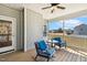 Relax on this screened-in porch, featuring comfortable seating and views of the outdoors at 190 Salem Village Dr, Fuquay Varina, NC 27526