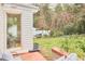 The backyard features a patio with comfortable seating and a well-maintained lawn at 1921 Clark Ave # 105, Raleigh, NC 27605