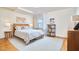Inviting bedroom with natural light, hardwood floors, and a cozy atmosphere at 1921 Clark Ave # 105, Raleigh, NC 27605
