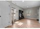 Bright entryway with hardwood floors, coat rack and ample natural light at 20 W Park Ln, Sanford, NC 27332