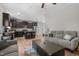 Open living space with view of kitchen, hardwood floors, and comfortable seating area at 20 W Park Ln, Sanford, NC 27332