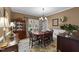 Traditional dining room features a wooden table, chandelier, and decorative accents at 2005 Bridgeport Dr, Raleigh, NC 27615