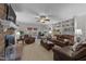 Spacious living room features a brick fireplace, built-in shelving and comfortable seating at 2005 Bridgeport Dr, Raleigh, NC 27615