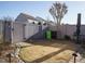 Cozy backyard featuring a privacy fence, patio area, and a well-maintained lawn at 2036 Big Falls Dr, Wendell, NC 27591