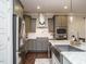 Modern kitchen featuring stainless steel appliances, granite countertops, and gray cabinets at 2036 Big Falls Dr, Wendell, NC 27591