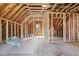 Spacious unfinished attic with exposed rafters and room for storage or expansion at 209 Ashmore Ln, Rocky Mount, NC 27804