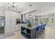 Gourmet kitchen with a large kitchen island, stainless steel appliances, and stylish lighting at 209 Ashmore Ln, Rocky Mount, NC 27804