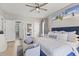 Bright and spacious bedroom features a cozy bed with decorative pillows and a bench at 209 Ashmore Ln, Rocky Mount, NC 27804