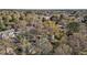 Property nestled among lush trees, showcased in a picturesque aerial shot of the neighborhood at 211 W Sycamore, Zebulon, NC 27597
