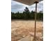 Expansive backyard with wooded views from the covered patio perfect for outdoor living at 228 Dove Rd, Cameron, NC 28326