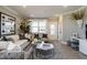 Living room with contemporary decor, neutral walls, and large windows filling the space with light at 2469 Englemann Dr # 366, New Hill, NC 27562