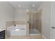 Beautiful bathroom with a separate shower and large soaking tub at 2523 Spring Oaks Way, Raleigh, NC 27614