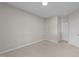 Spacious carpeted bedroom offering ample natural light and closet space at 2523 Spring Oaks Way, Raleigh, NC 27614