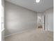 Neutral bedroom with carpet, base molding, and an ensuite bathroom at 2523 Spring Oaks Way, Raleigh, NC 27614