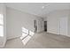 Bright bedroom with neutral carpet, a ceiling fan, and ample natural light at 2523 Spring Oaks Way, Raleigh, NC 27614