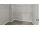 Spacious walk-in closet with carpet flooring and wire shelving at 2523 Spring Oaks Way, Raleigh, NC 27614