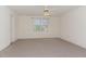 Bedroom offers neutral walls, carpet, ceiling fan and window with natural light at 2608 Broad Oaks Pl, Raleigh, NC 27603
